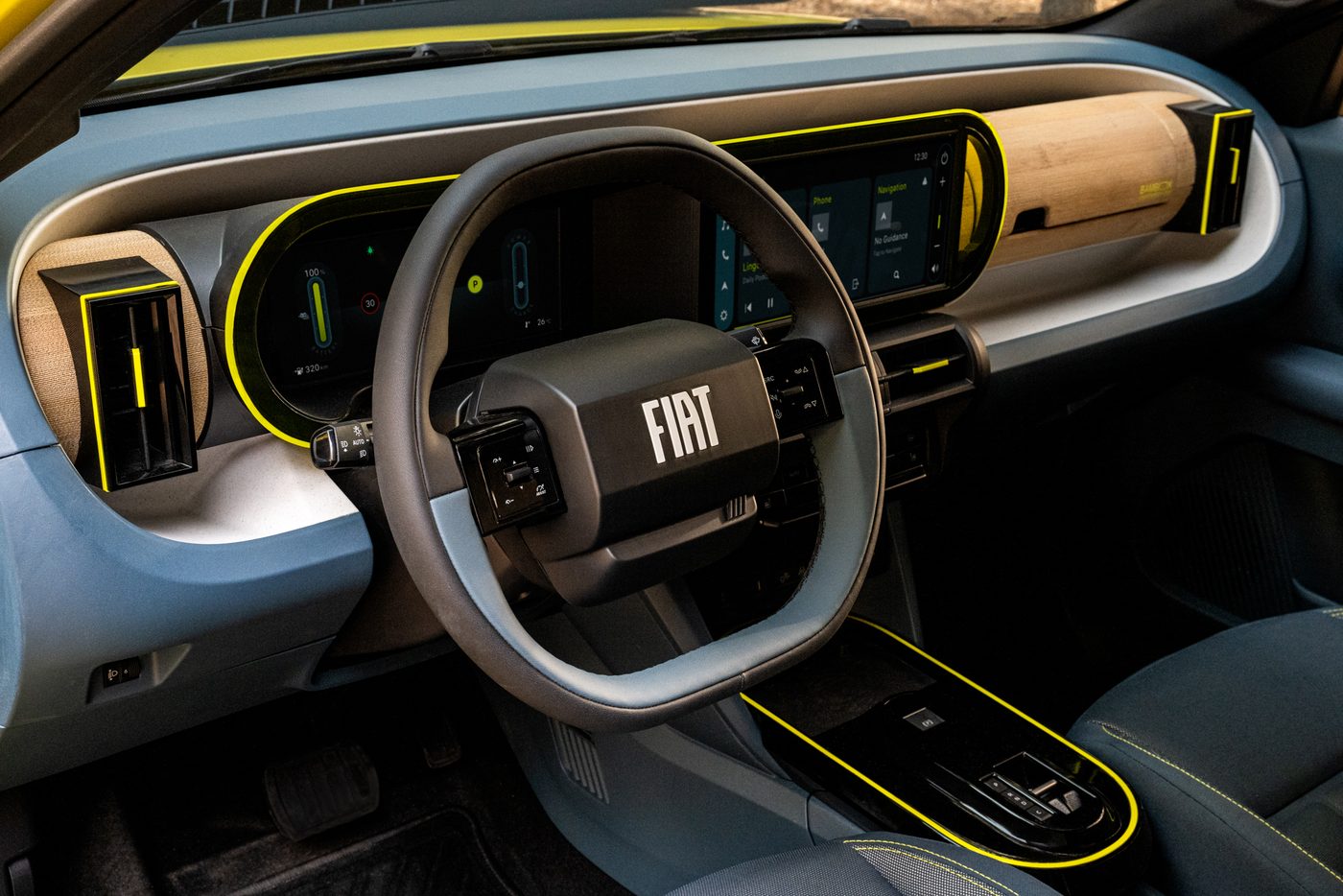 FIAT Grande Panda interior — steering wheel and dashboard with touchscreen